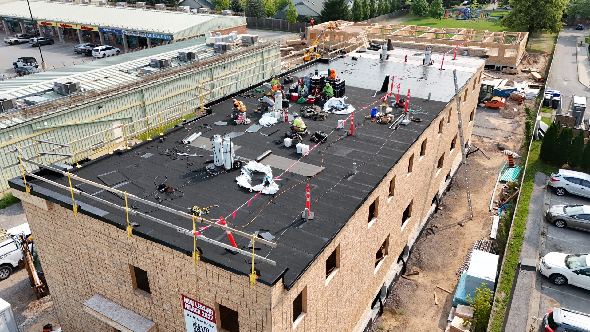 Parkside39 Apartments — Roof membrane installation on Block A, August 2026